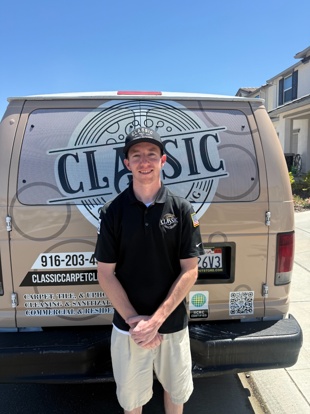 Justin Bramblett, Lead Technician, in front of the Classic Carpet Cleaning service van